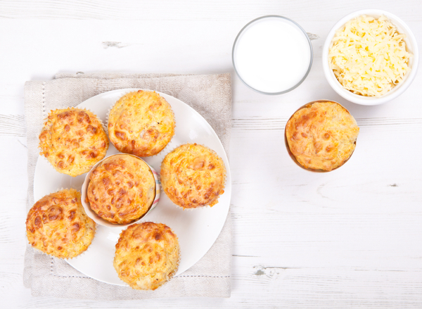 Savory cheese and bacon muffins on the white table