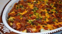 Ingredients: 6 pounds Idaho potatoes, peeled and quartered Salt 2 teaspoons freshly ground black pepper 1/2 cup butter 1 (12-ounce) carton sour cream 1 (8-ounce) bag of cheddar cheese, grated […]