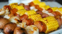 Ingredients 1/2 pound small new potatoes 2 small ears corn, cut into 1 1/2-inch rounds 1/2 pound andouille, cut into 1-inch rounds 1/2 pound large shrimp, peeled and deveined 1/4 […]