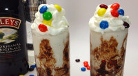 Ingredients: 1 oz. (30ml) Irish Cream 1 oz. (30ml) Vanilla Vodka 1 oz. (30ml) Butterscotch Schnapps Vanilla Ice Cream M&M Candy http://www.youtube.com/TIPSYBARTENDER