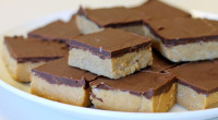 Ingredients: 1/2 cup (1 stick) butter 1 cup + 2 tablespoons creamy peanut butter, divided 1 cup graham cracker crumbs 1 cup powdered sugar 1 cup chocolate chips Directions: 1. […]