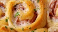 Ingredients: 1 (8-oz.) tube crescent roll dough 1/2 lb. deli sliced ham 2 tbsp. Dijon mustard 8 oz. sliced Swiss cheese 4 tbsp. butter, melted 1/4 tsp. garlic powder 2 […]